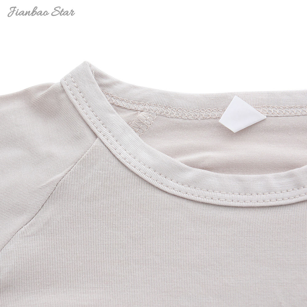 Barboteuse unisexe à manches longues pour bébé, nouvel arrivage, haute qualité, couleur unie, bouton en bambou, personnalisé