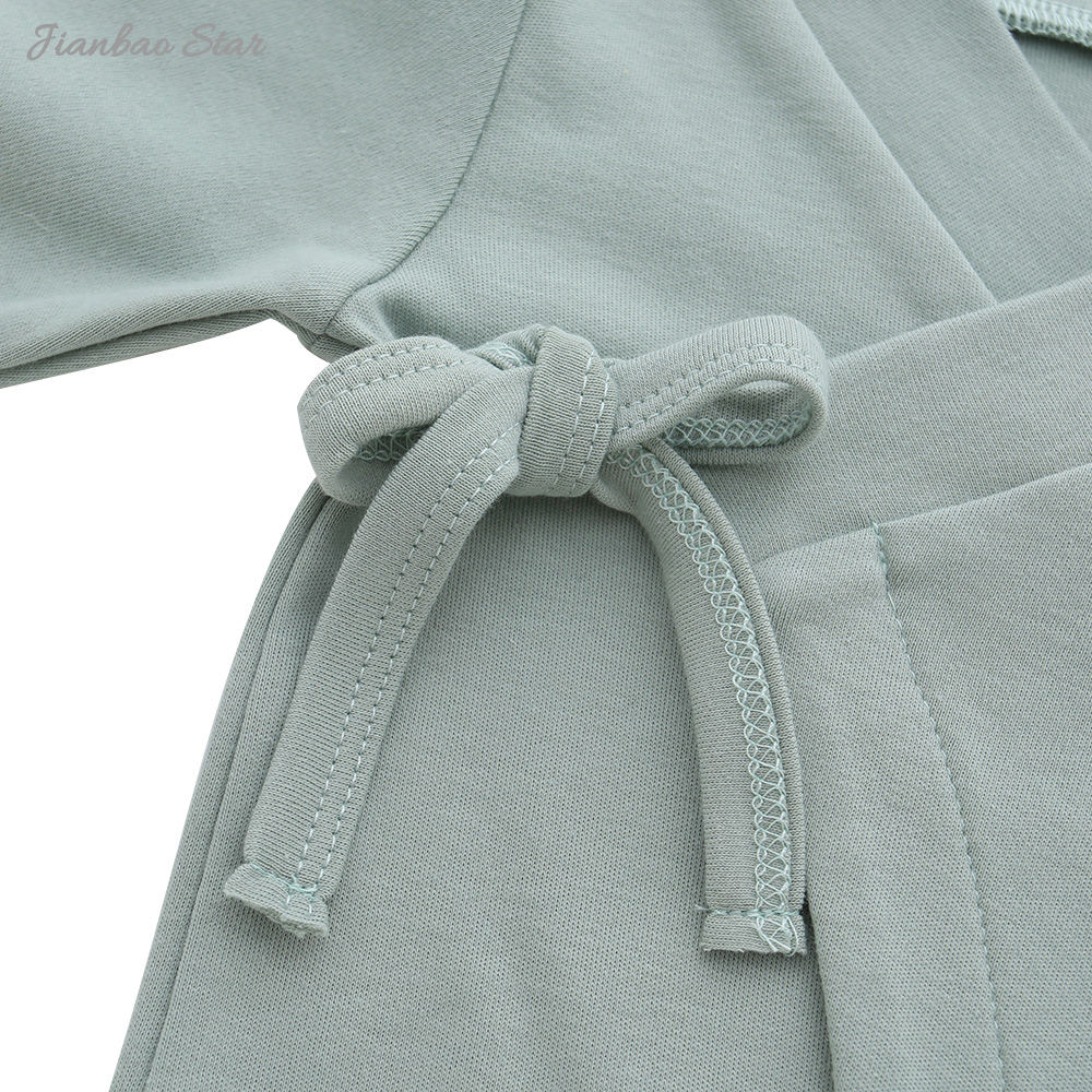 Usine offre spéciale nouveau Design populaire couleur personnalisée côté cravate patte à lacets à manches longues bébé barboteuses vêtements de bébé