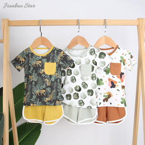Top vente nouveau Design de haute qualité 100% coton confortable Style d'été décontracté à manches courtes bébé costume bébé vêtements avec poche