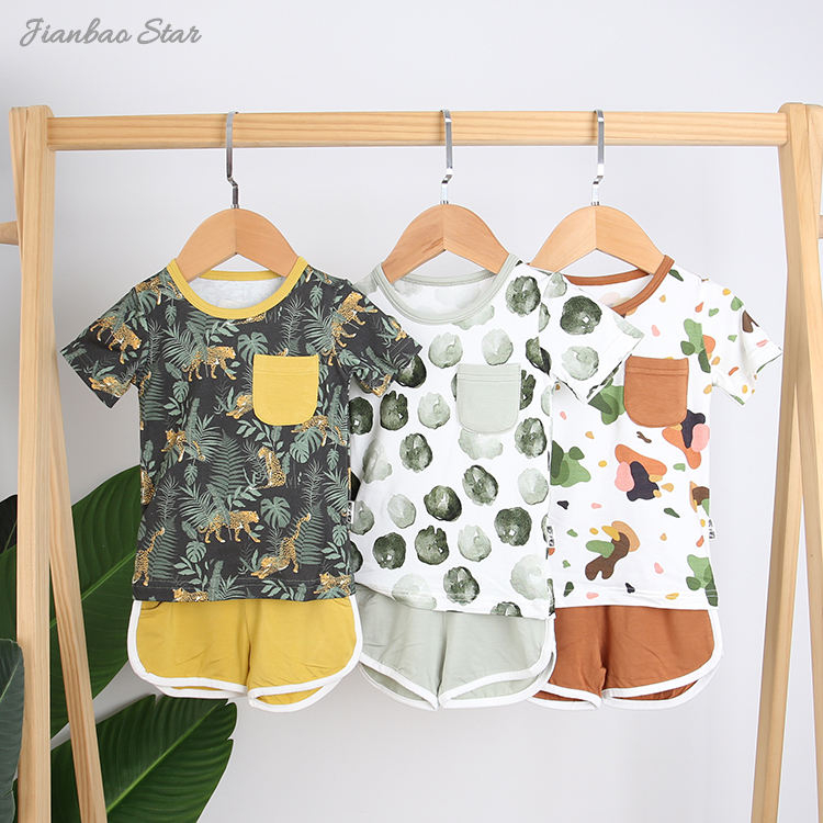 Top vente nouveau Design de haute qualité 100% coton confortable Style d'été décontracté à manches courtes bébé costume bébé vêtements avec poche