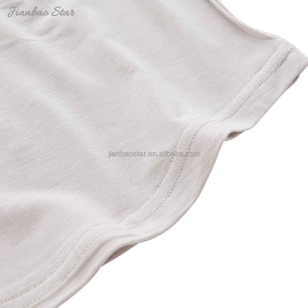 Tenue ample de Style classique, vêtements de nuit de couleur unie, T-shirt à manches courtes en coton et bambou pour bébés, enfants et adultes, vente en gros