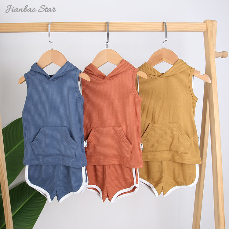 Nouveau Design tenues couleurs unies haute qualité bébé vêtements ensemble côtelé bambou sans manches sweats à capuche unisexe et pantalons courts