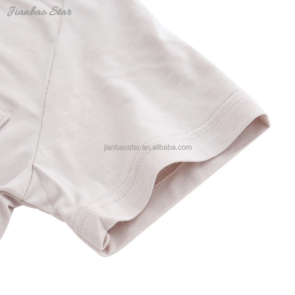 Tenue ample de Style classique, vêtements de nuit de couleur unie, T-shirt à manches courtes en coton et bambou pour bébés, enfants et adultes, vente en gros