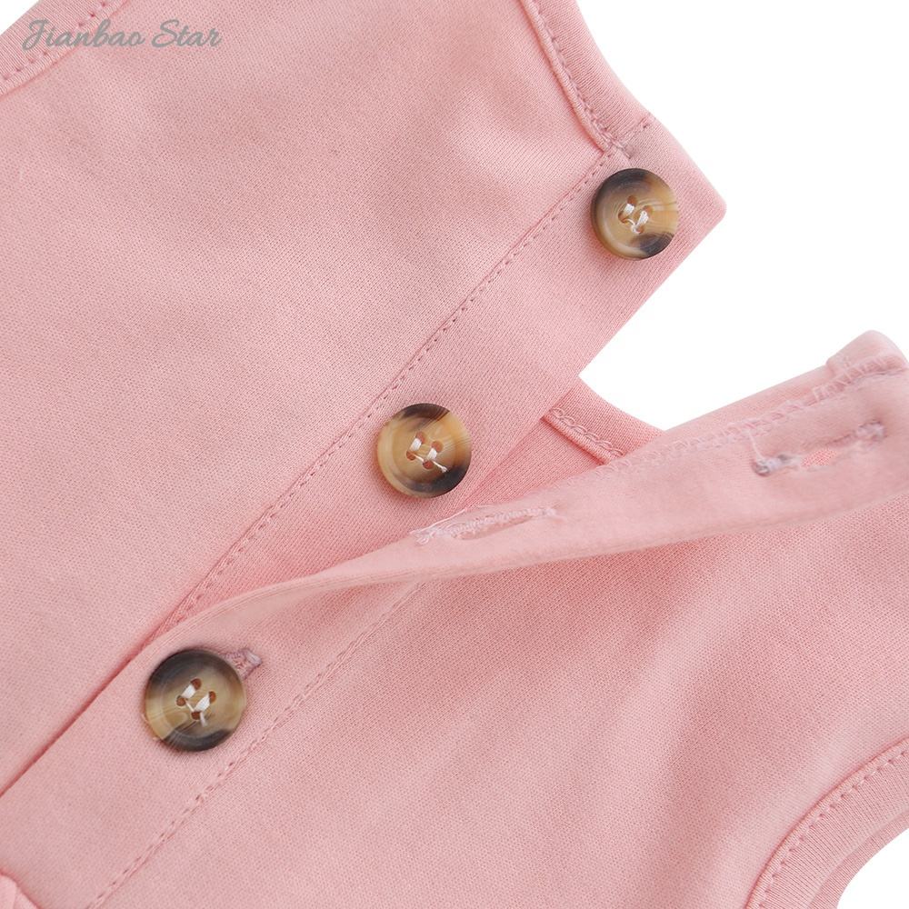 Nouveautés haute qualité 100% coton belle couleur à volants boutons sans manches nouveau-né bébé fille robe barboteuse