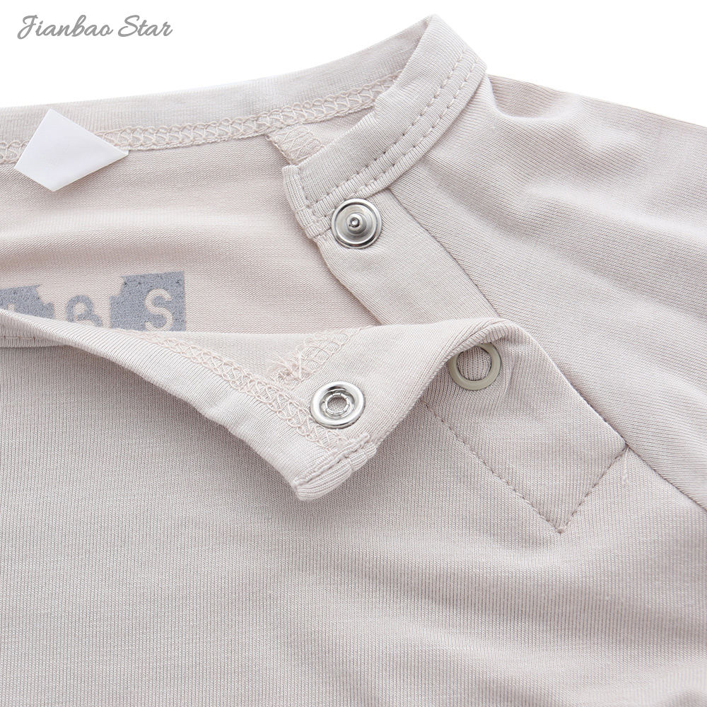 Barboteuse unisexe à manches longues pour bébé, nouvel arrivage, haute qualité, couleur unie, bouton en bambou, personnalisé