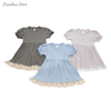 Nouveau Design à manches courtes bébé vêtements doux personnalisé haute pittoresque bambou dentelle bord infantile tenue couleur unie bébé robe
