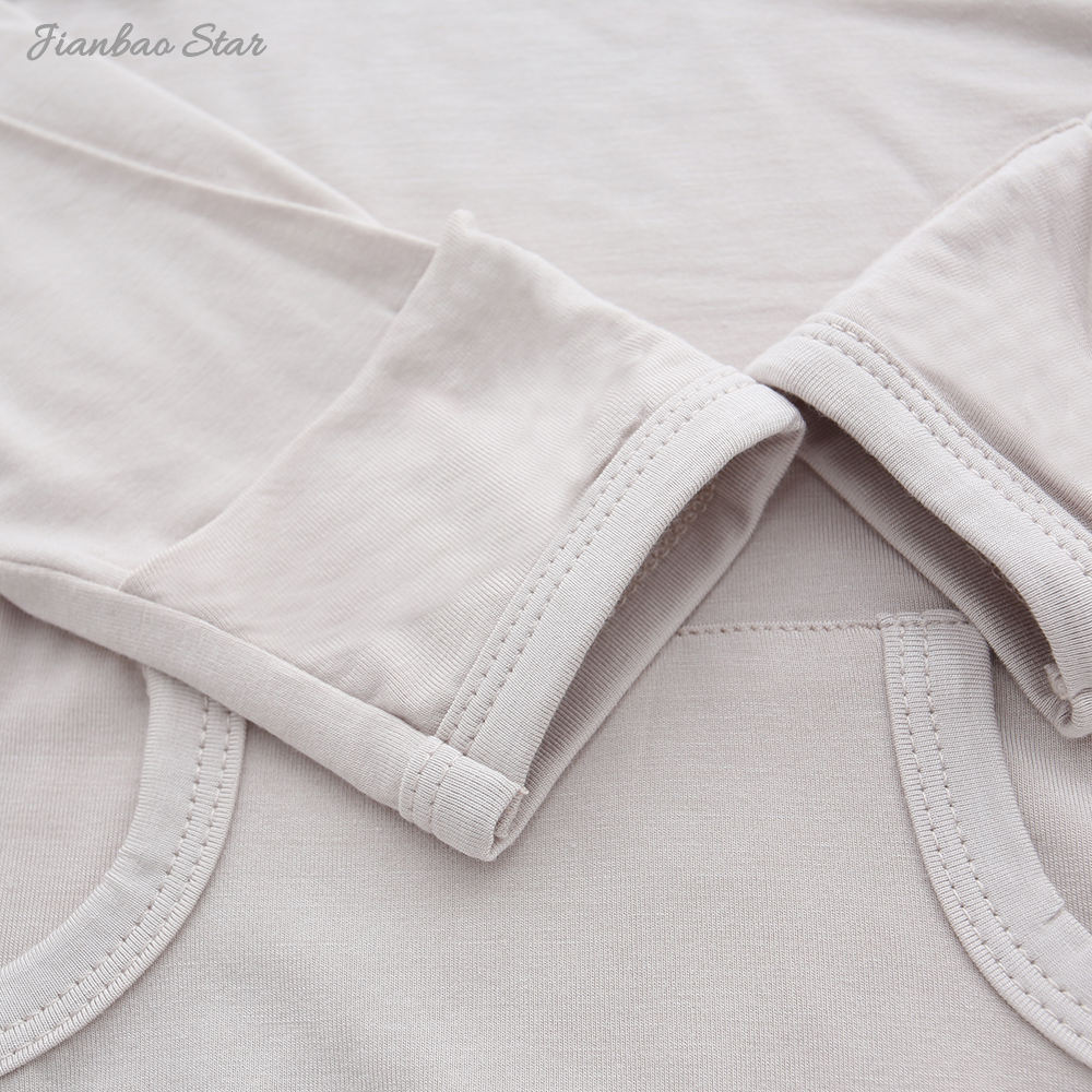 Barboteuse unisexe à manches longues pour bébé, nouvel arrivage, haute qualité, couleur unie, bouton en bambou, personnalisé