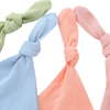 Chapeaux de bébé en gros tissu de bambou couleur unie douce décoration faciale OEM chapeaux de bébé unisexes personnalisés pour toutes les saisons